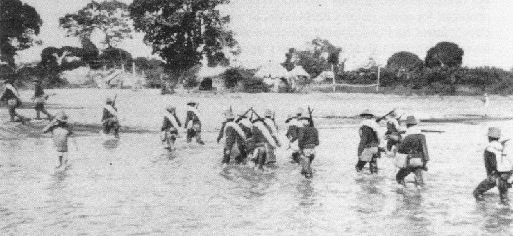 File:Men of the 29th volunteer infantry wading ashore on Marinduque 25 April 1900.jpg