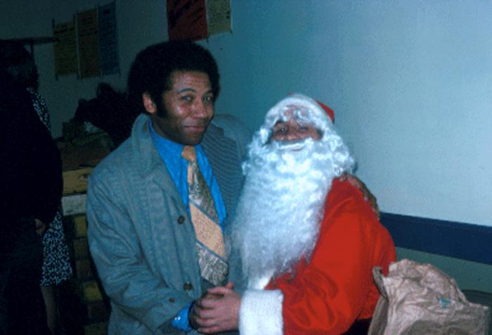 File:Seattle - Man with Santa at Pike Place Market merchants' holiday party, 1975 (32511482998).jpg