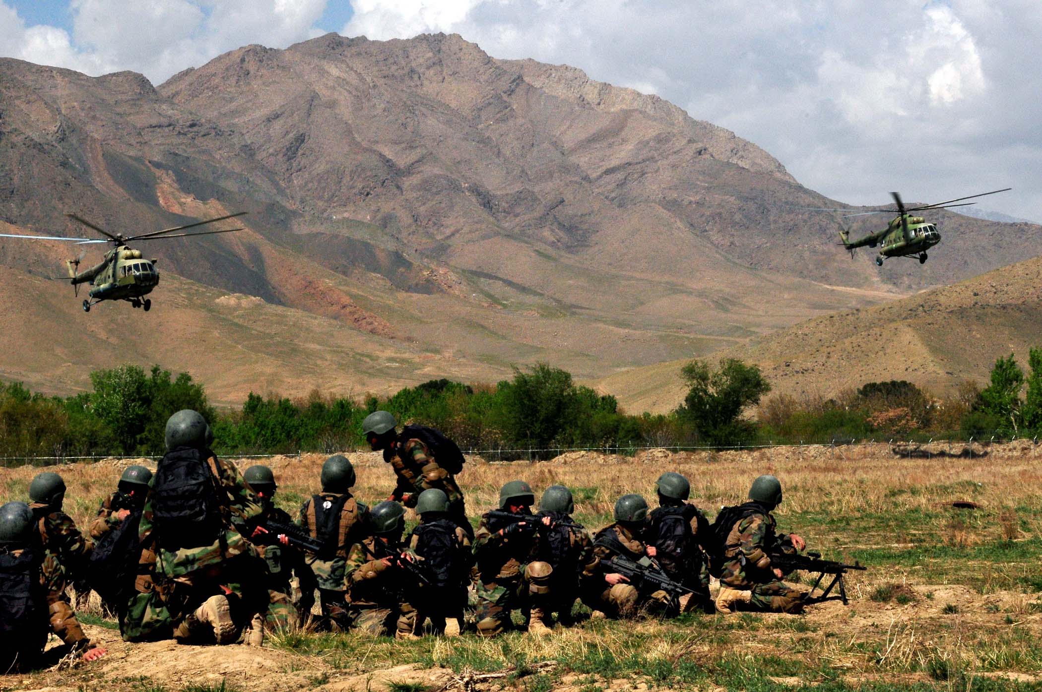 Afghan commandos and helicopters.jpg