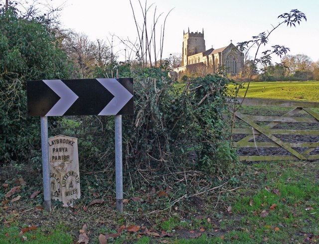 File:Milepost and Church - geograph.org.uk - 626749.jpg