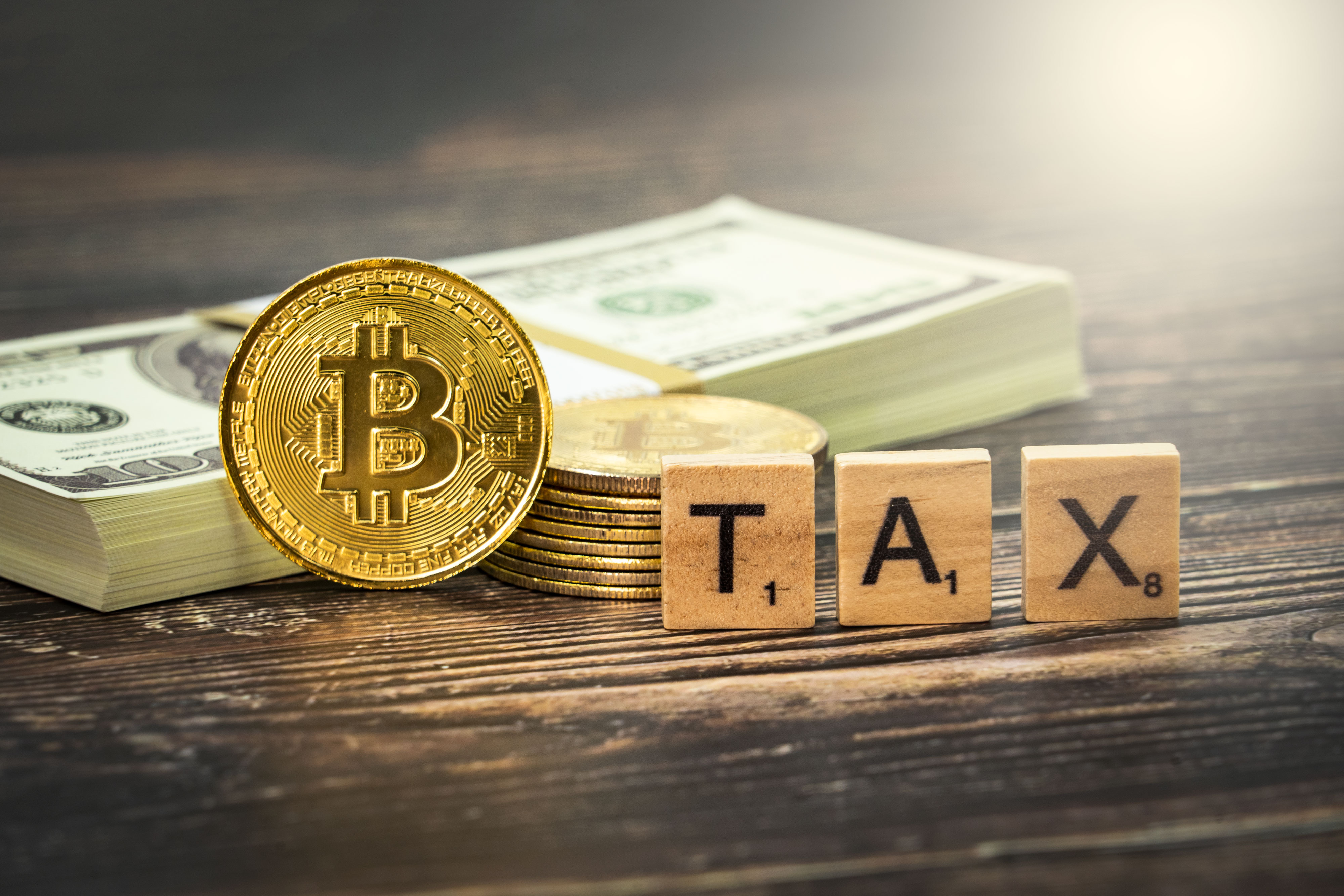 File:Crypto Tax - Bitcoin Medallions and Word "Tax".jpg - Wikimedia Commons