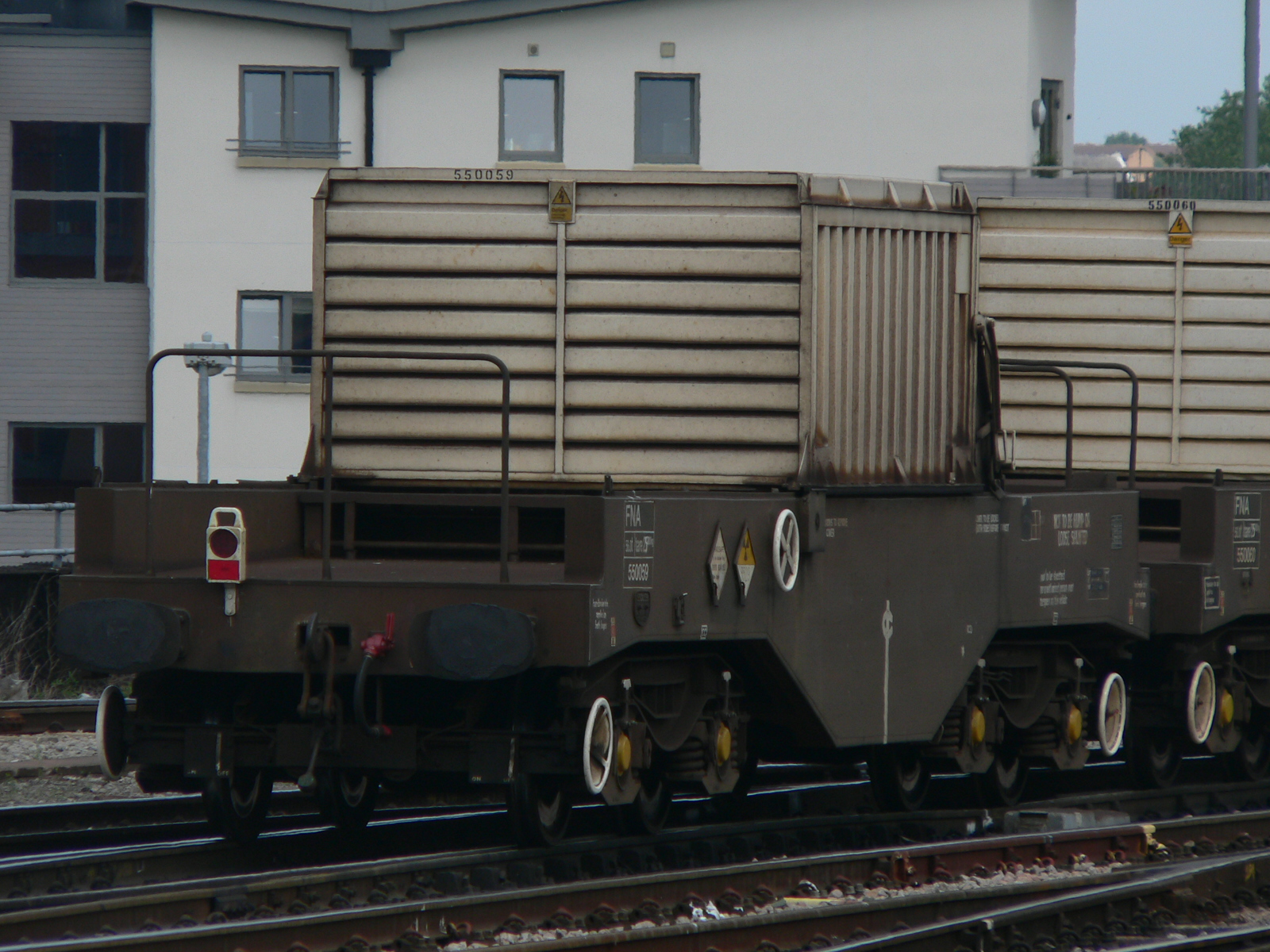 One wagon of a nuclear waste flask train being hauled through Bristol Temple Meads railway station by Direct Rail Services Class 37 diesel locomotives 37612 and 37069 en-route from Hinkley Point Power Station to Sellafield.