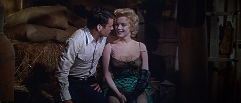 http://upload.wikimedia.org/wikipedia/commons/d/da/Don_Murray_and_Marilyn_Monroe_in_Bus_Stop_trailer.jpg