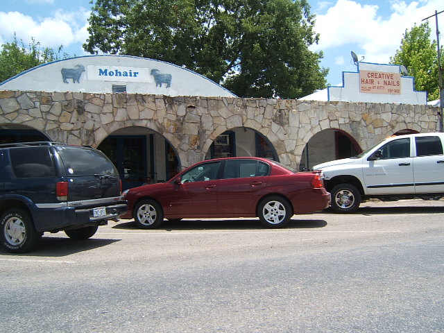 File:Camp Wood stone facade store front.jpg