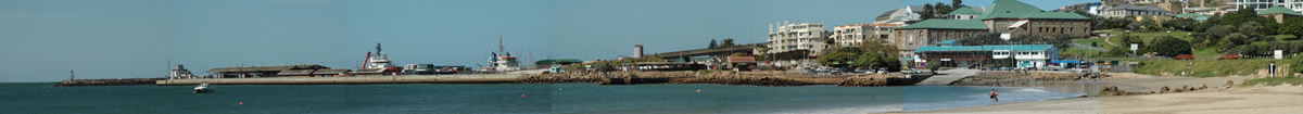 Panorama of the Mossel Bay harbour, Dolosse and MBYBC