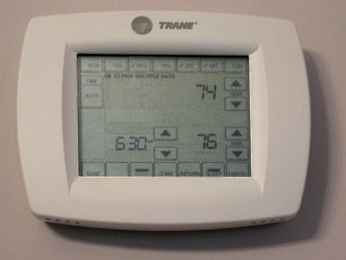 A touch-screen programmable thermostat