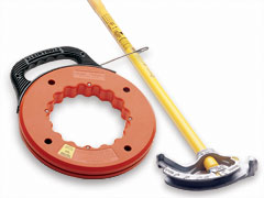 Two of the tools commonly used by electricians. The fish tape is used to pull conductors through conduits, or sometimes to pull conductors through hollow walls. The conduit bender is used to make accurate bends and offsets in electrical conduit. 11-FishTapes ConduitTools.jpg