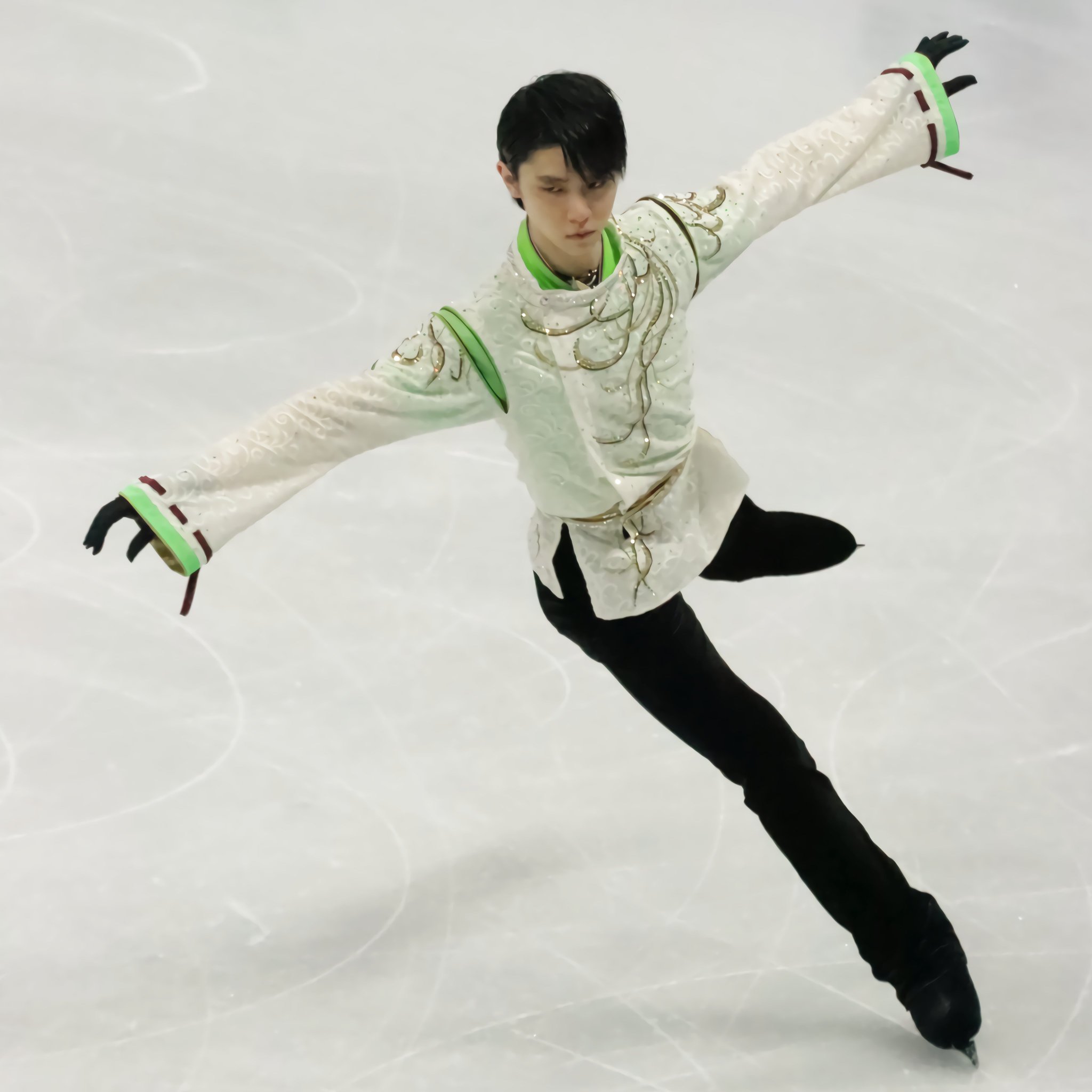 Hanyu in the landing position after a jump in his free skate program Seimei at the 2020 Four Continents Championships in Seoul