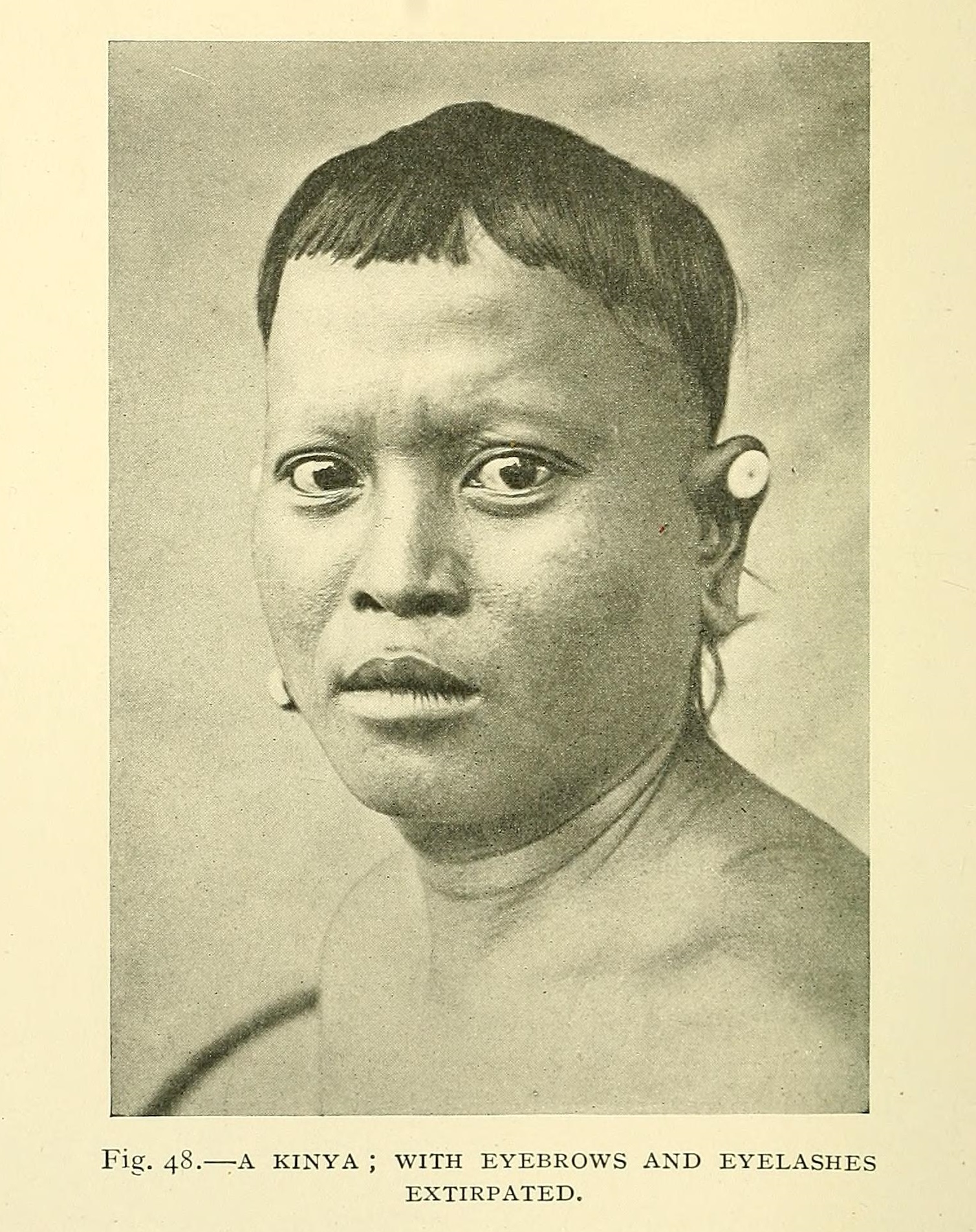 A kinya with eyebrows and eyelashes extirpated.jpg English: "A Kinya (tribe of inland Borneo) with eyebrows and eyelashes extirpated" Date 1904 Source