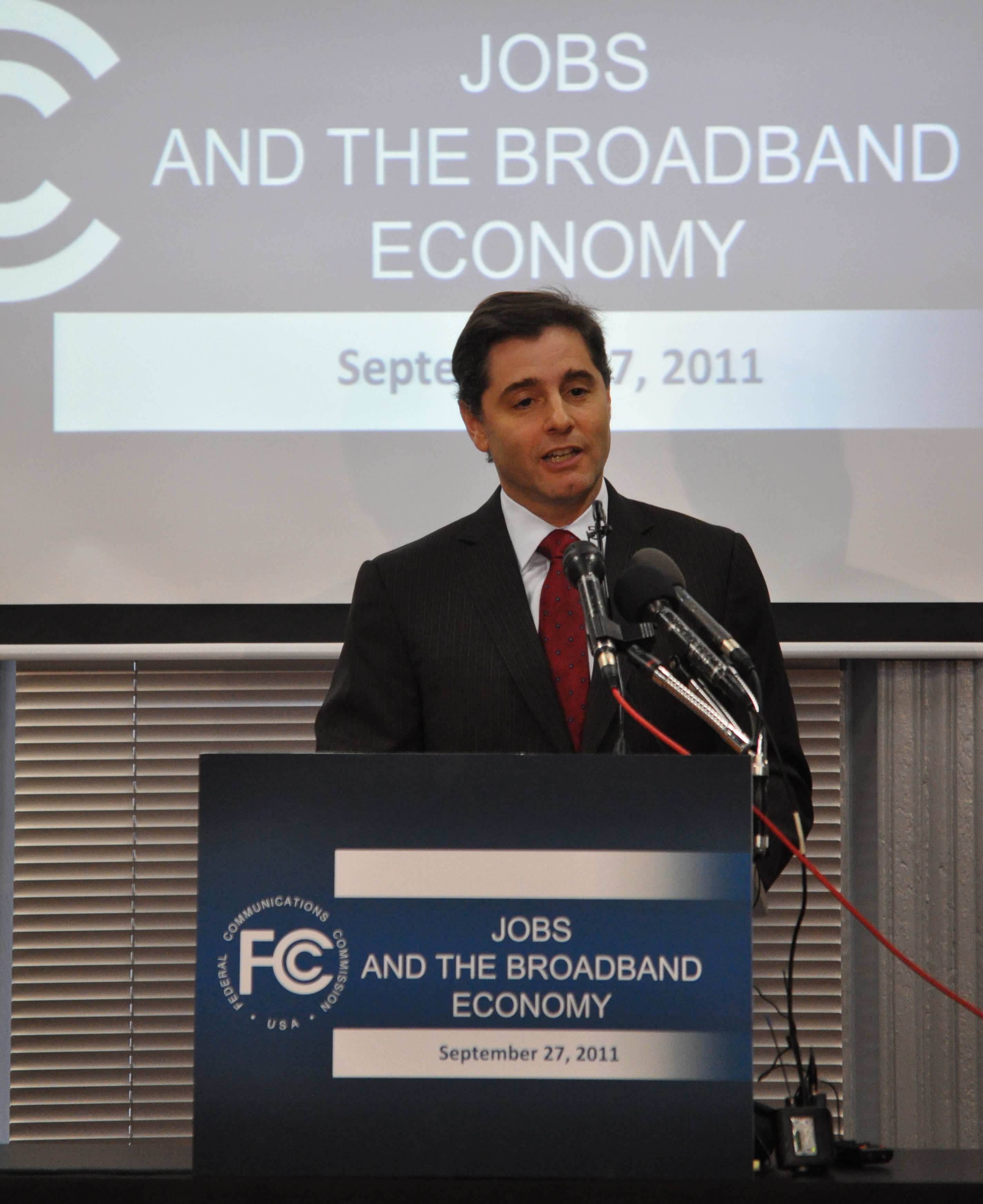 Jobs and the Broadband Economy (6189438237).jpg FCC Chairman Genachowski Date 26 September 2011, 22:53 Source Jobs and the Broadband Economy