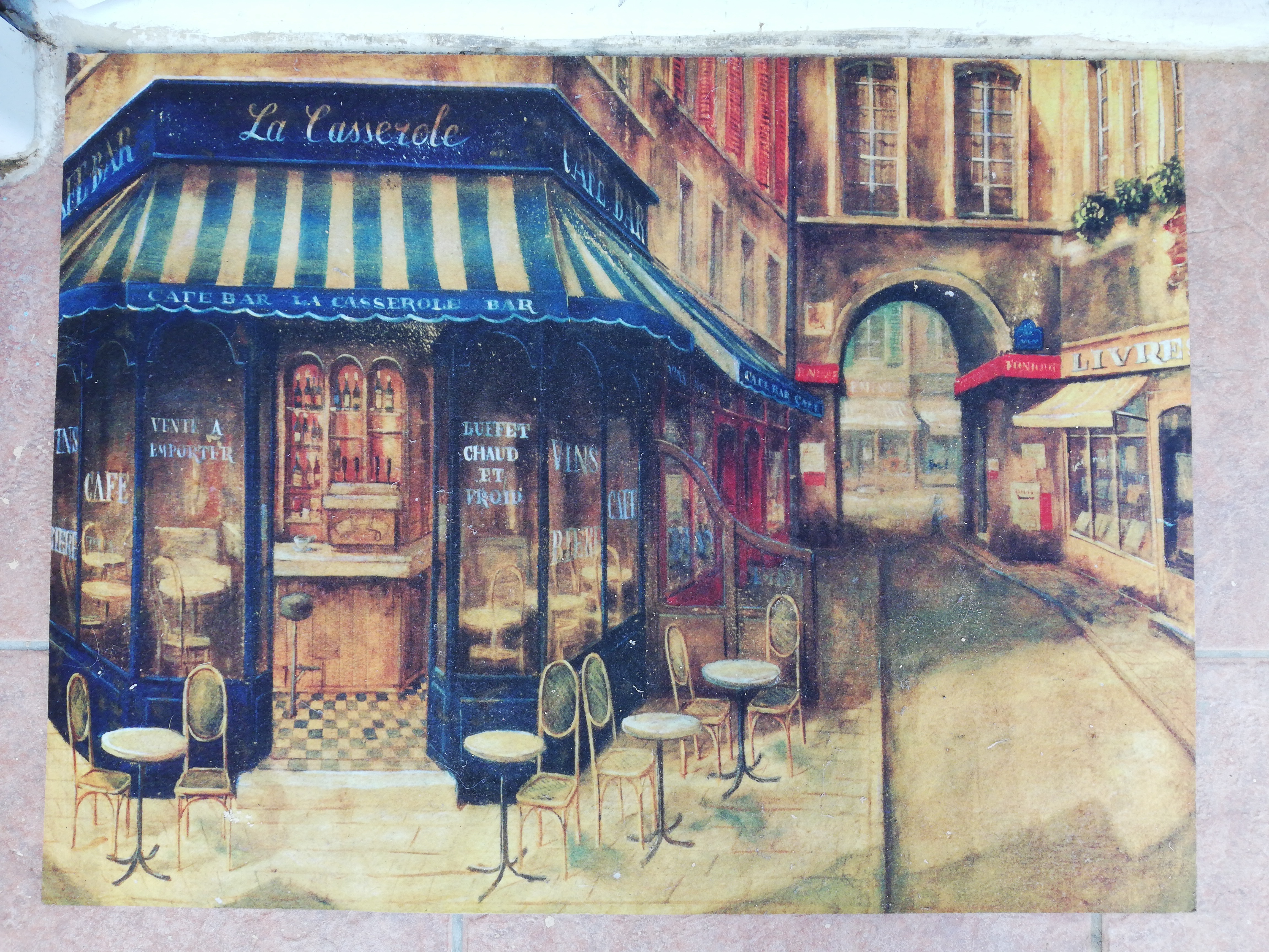 Flat mat with a painting of a [[Paris