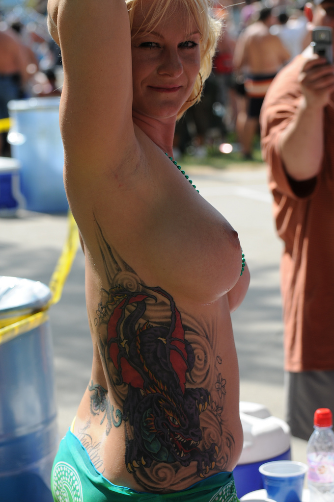 Topless girls with tattoos