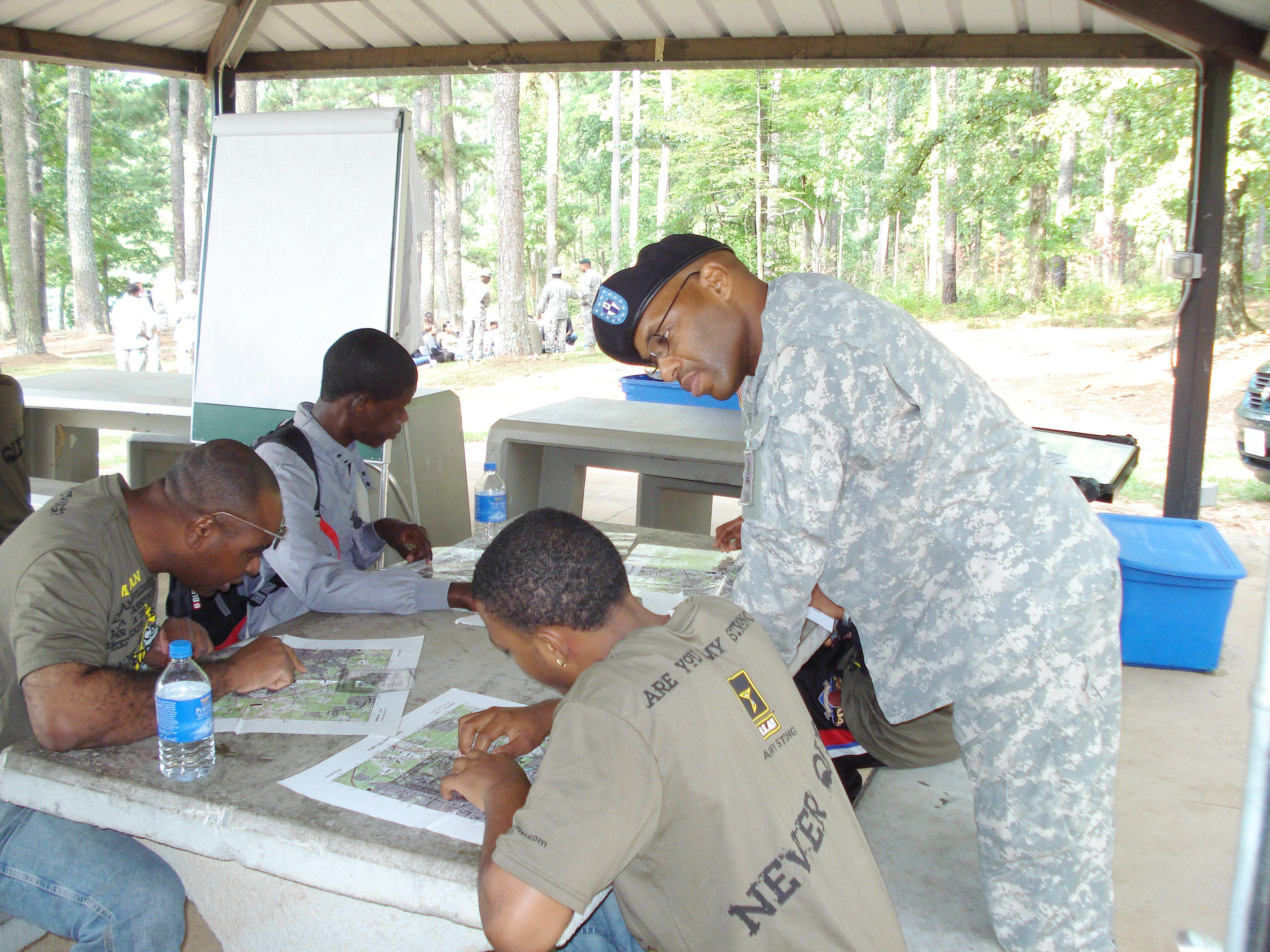  An army trainer mentors new soldiers.