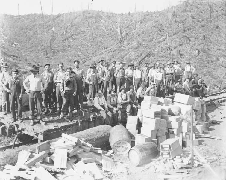 File:Logging crew standing on flat car with supplies in the foreground, Saginaw Timber Company, ca 1923 (KINSEY 520).jpeg