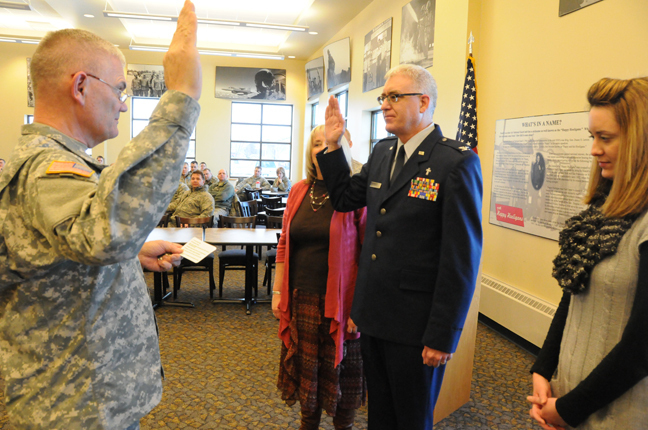 File:Army Maj. Gen. David Sprynczynatyk, left, the North Dakota adjutant general, administers the oath of office to Air Force Col. John Flowers, the North Dakota National Guard Joint Force Headquarters chaplain 130117-Z-WA217-051.jpg