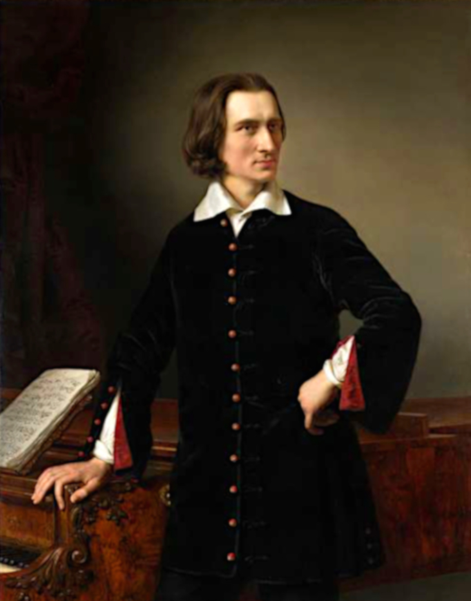 Young Franz Liszt - young man with jaw length hair posing next to piano with one hand on the piano and the other on his hip in a long buttoned trench coat.