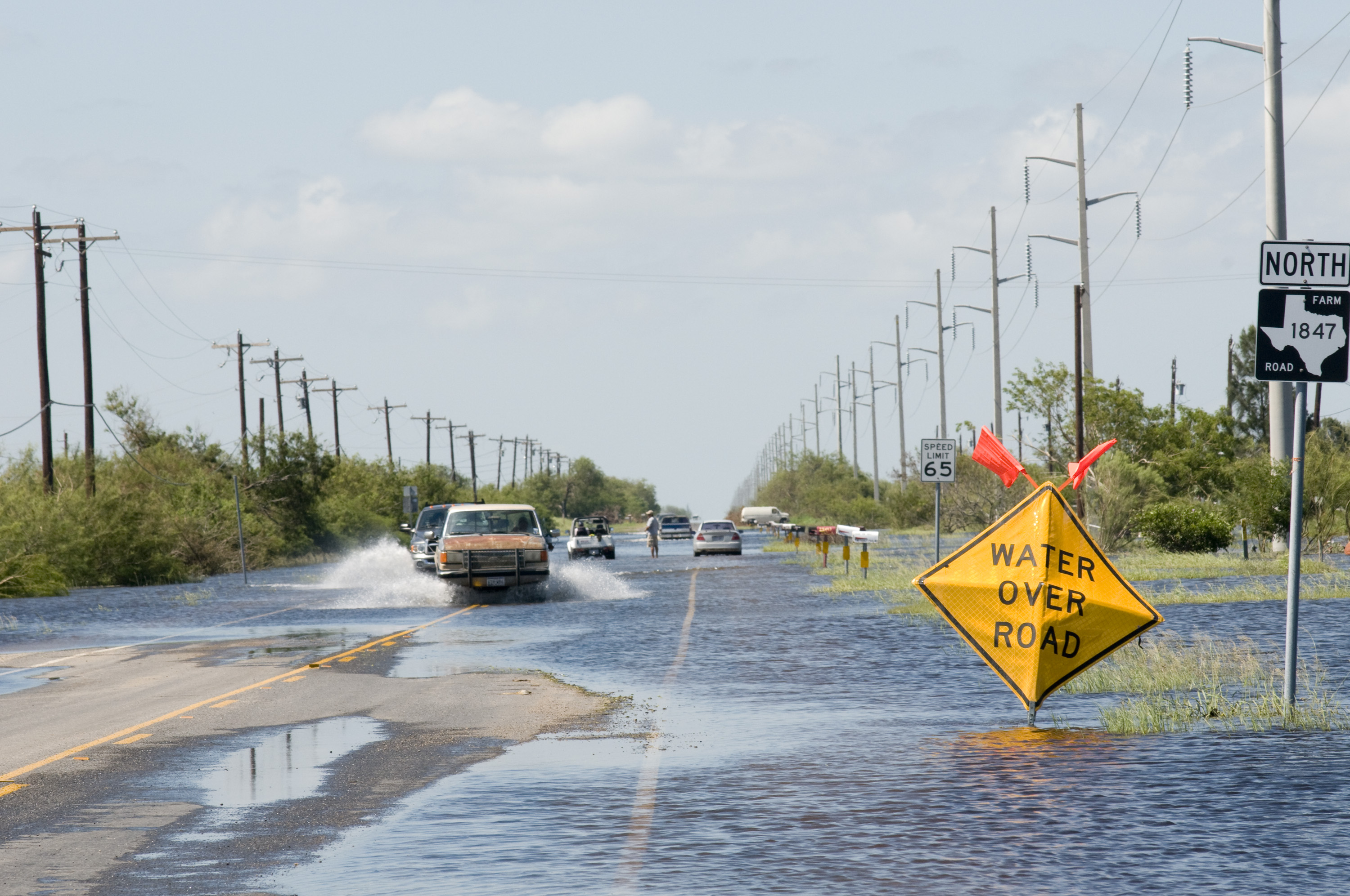 Road market. Texas Flood. Water over Road. Flooded Road.