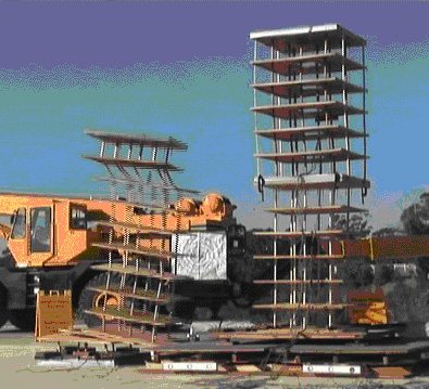 Shake-table crash testing of a regular building model (left) and a base-isolated building model (right)[4] at UCSD