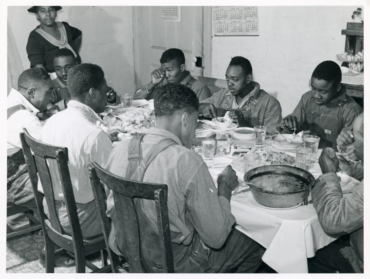 File:The Negro tenants and neighbors eating dinner after the whit... (3109741227).jpg