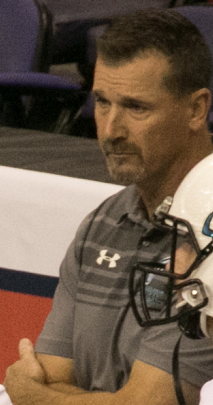 <span class="mw-page-title-main">Clint Dolezel</span> American football player and coach (born 1970)