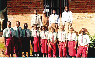 Staff and pupils at Isaac Newton High School. Isaac newton high school.png