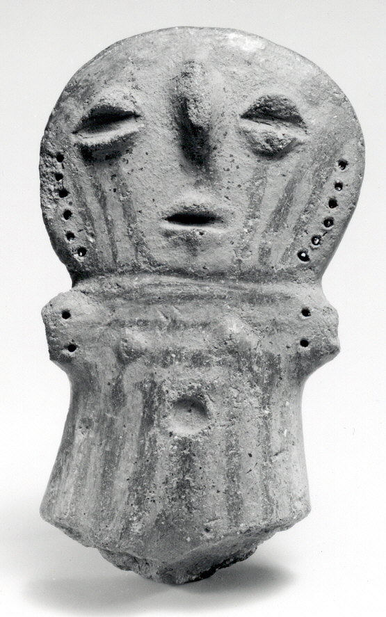 Фрагмент керамической фигурки женщины