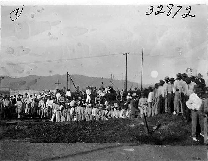 File:Line of men waiting for pay car (3608378540).jpg