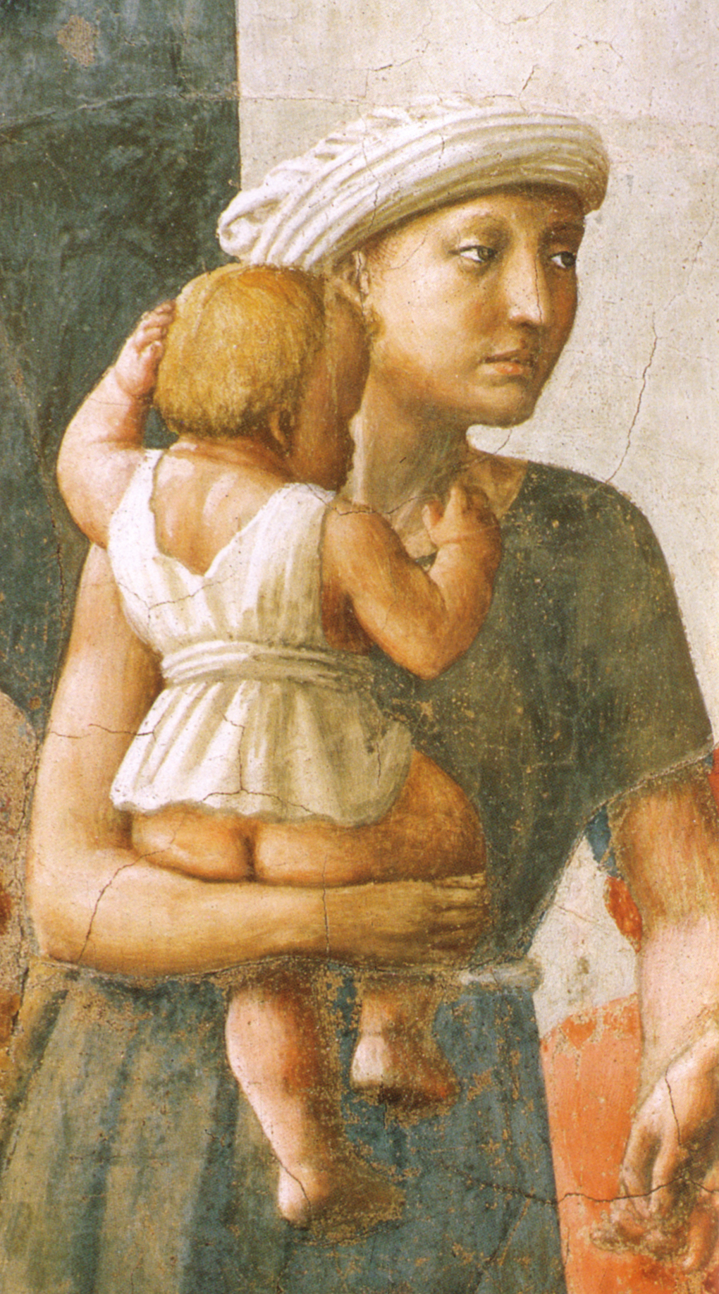 Masaccio, La Distribuzione delle elemosine e la morte di Anania (dettaglio una donna con un bambino in braccio), affresco nella Cappella Brancacci, Santa Maria del Carmine, Firenze