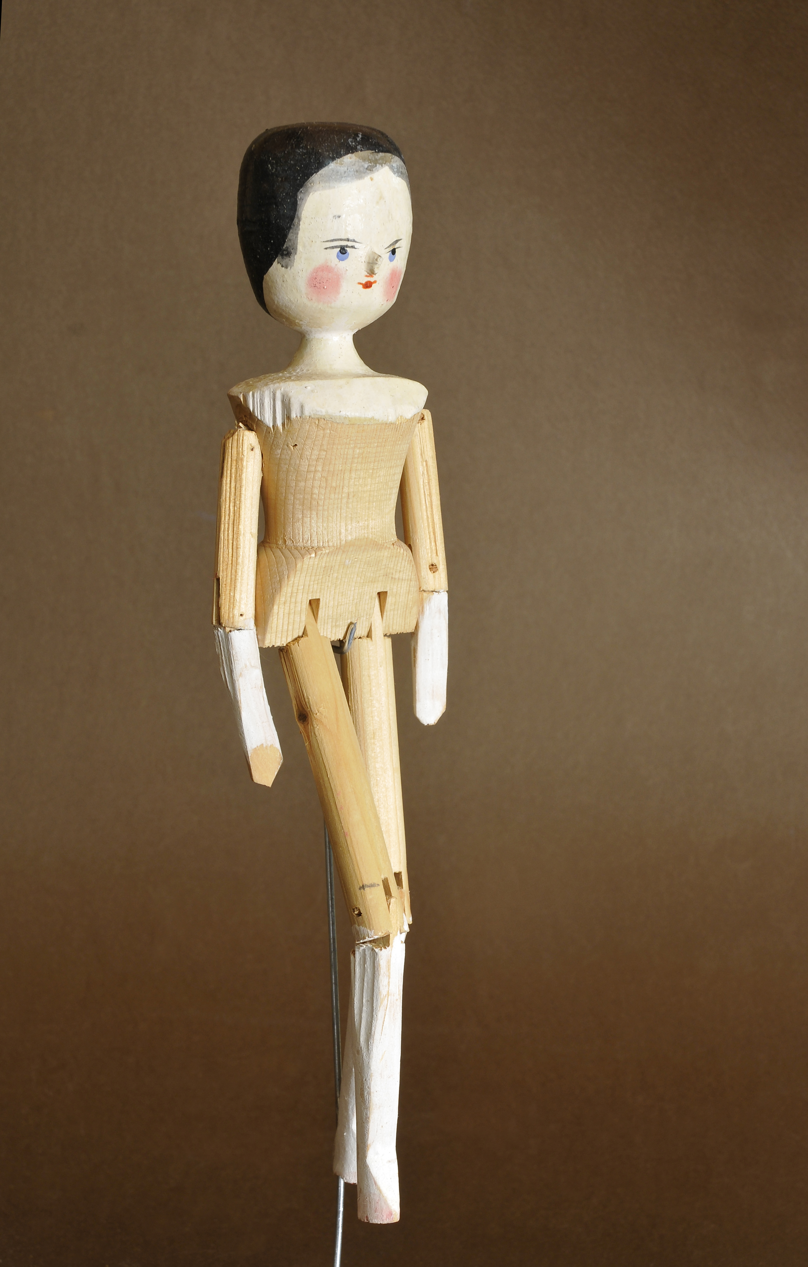 creepy wooden doll
