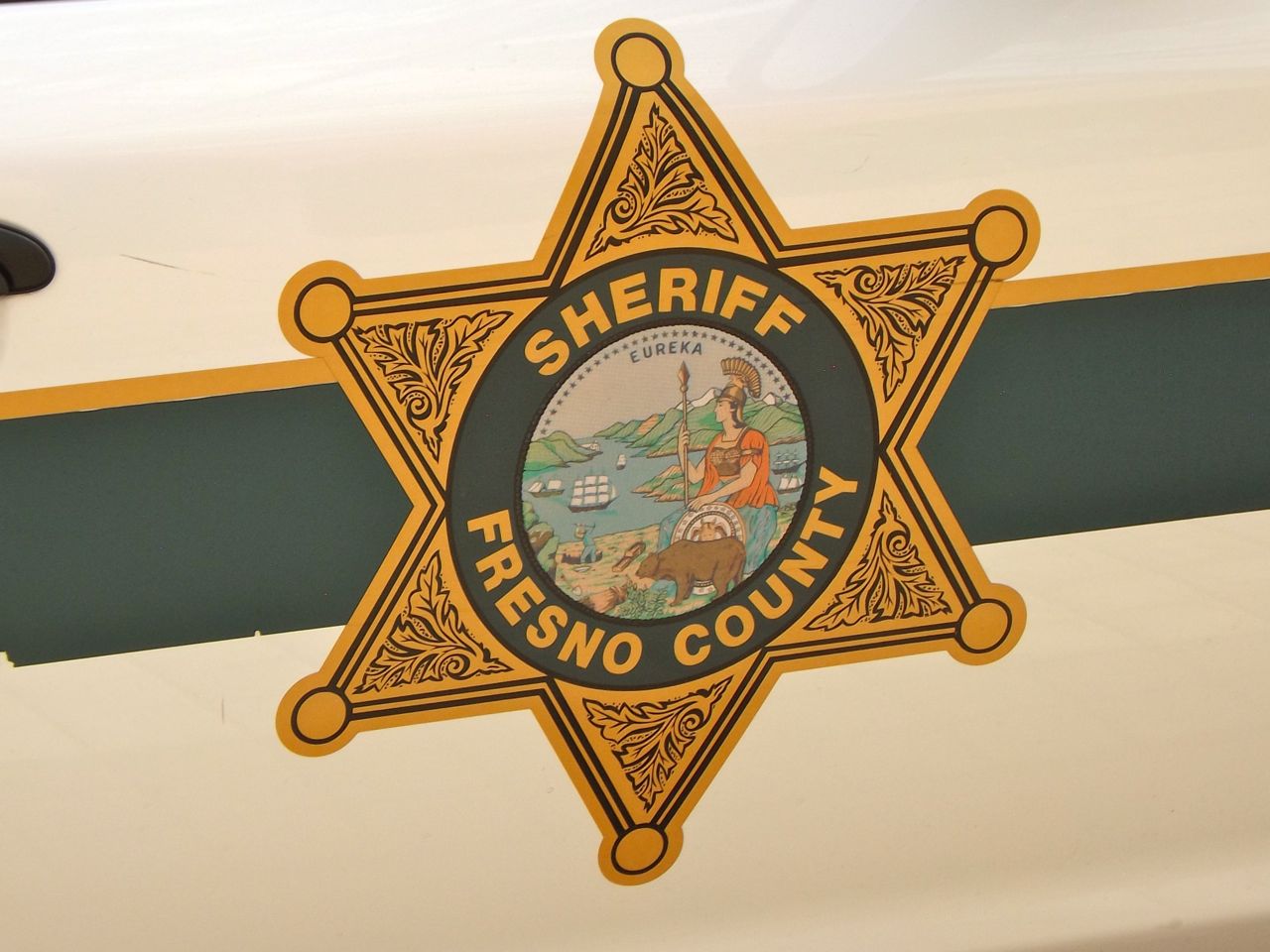 File:Fresno County, California, sheriff symbol on side of patrol car,   - Wikimedia Commons