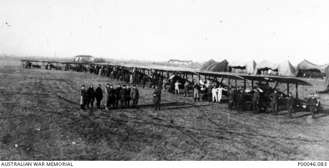 File:Istrana, Members of No. 45 Squadron, Royal Flying Corps, standing in front of a Sopwith Camel aircraft on the airfield.jpg