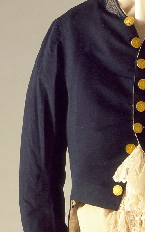 https://upload.wikimedia.org/wikipedia/commons/e/ed/Broadcloth_detail_on_a_Man%27s_Military_Uniform_LACMA_M.65.8a-d.jpg