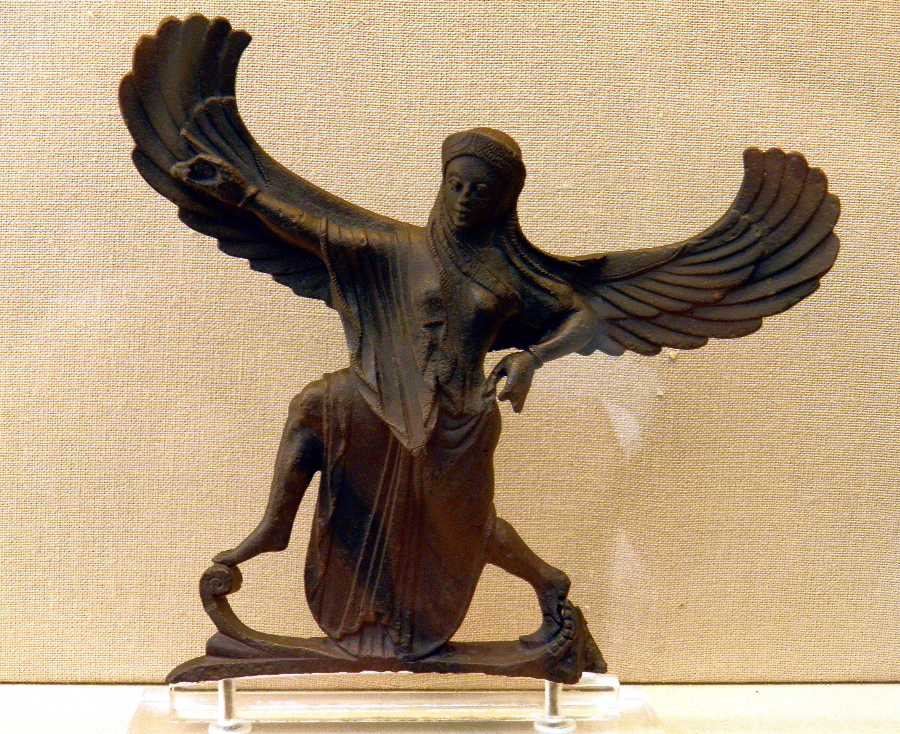 File:Bronze Nike striding forwards, in Taranto, Italy, about 500 Winning at the ancient Games, British Museum (7667177546).jpg - Wikimedia Commons