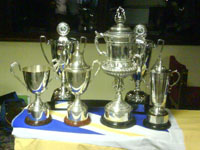 The trophies won by the club's first team, reserves and youths in 2006-07. The Sheffield and Hallamshire Senior Cup is the third trophy from the right. Stocksbridge Park Steels F.C. collection of trophies for 2006-2007.jpg