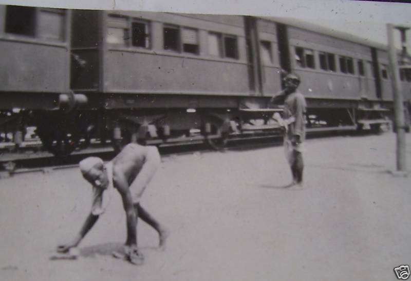 File:A crippled man near a train in India in the 1920s.JPG - Wikimedia Comm...
