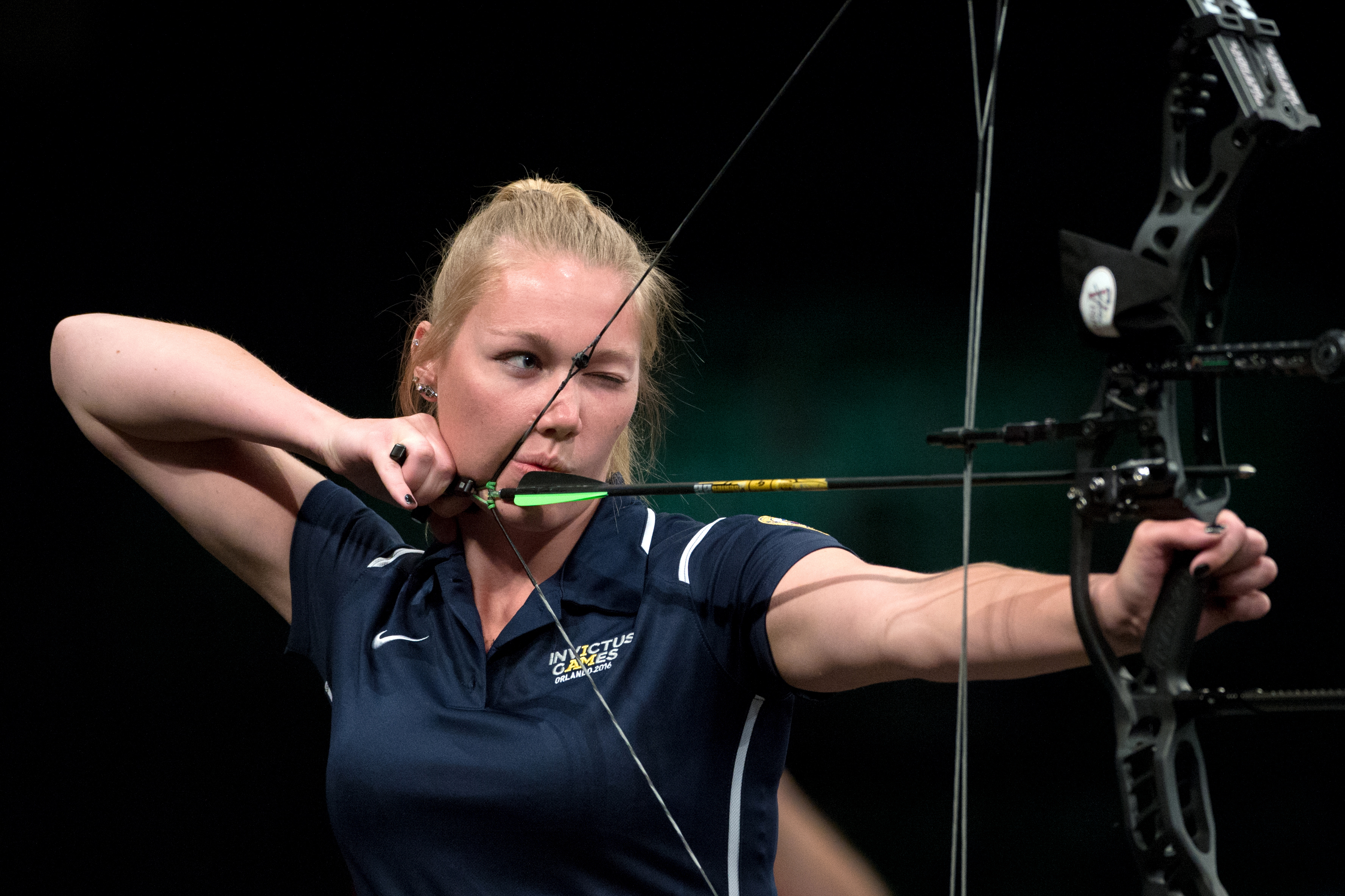 U.S. Invictus team archer Chasity Kuczer takes aim during an archery gold medal round at the 2016 Invictus Games (26925974655)