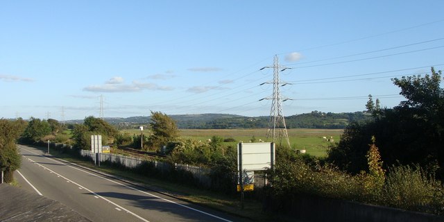 File:A484, with railway and pylon line parallel - geograph.org.uk - 1480660.jpg