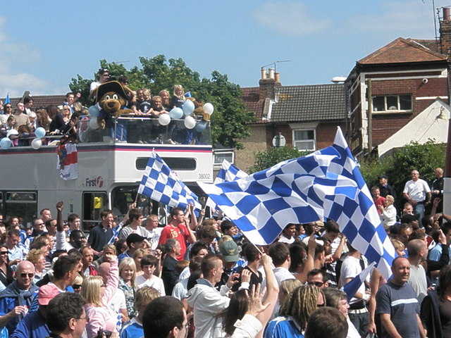 File:Flags wave as the wives and children pass - geograph.org.uk - 807245.jpg