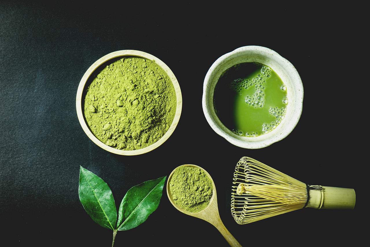 Matcha layout with leaf, tea, and powder.jpg