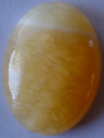 File:Citrine cabochon gemstone.JPG