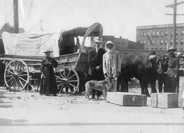 File:Ezra Meeker with others in front of ox-drawn wagon, Seattle, Washington, ca 1906-1928 (PORTRAITS 1348).jpg