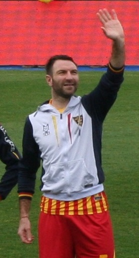 Captain Fabio Lucioni (US Lecce) raises the cup to the sky for the