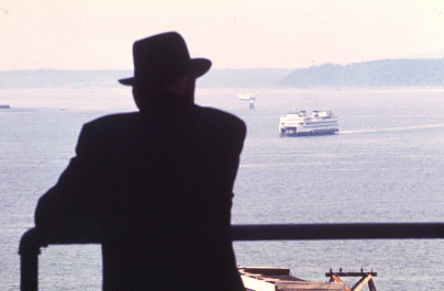 File:Man watching ferry from Pike Place Market, 1972.jpg