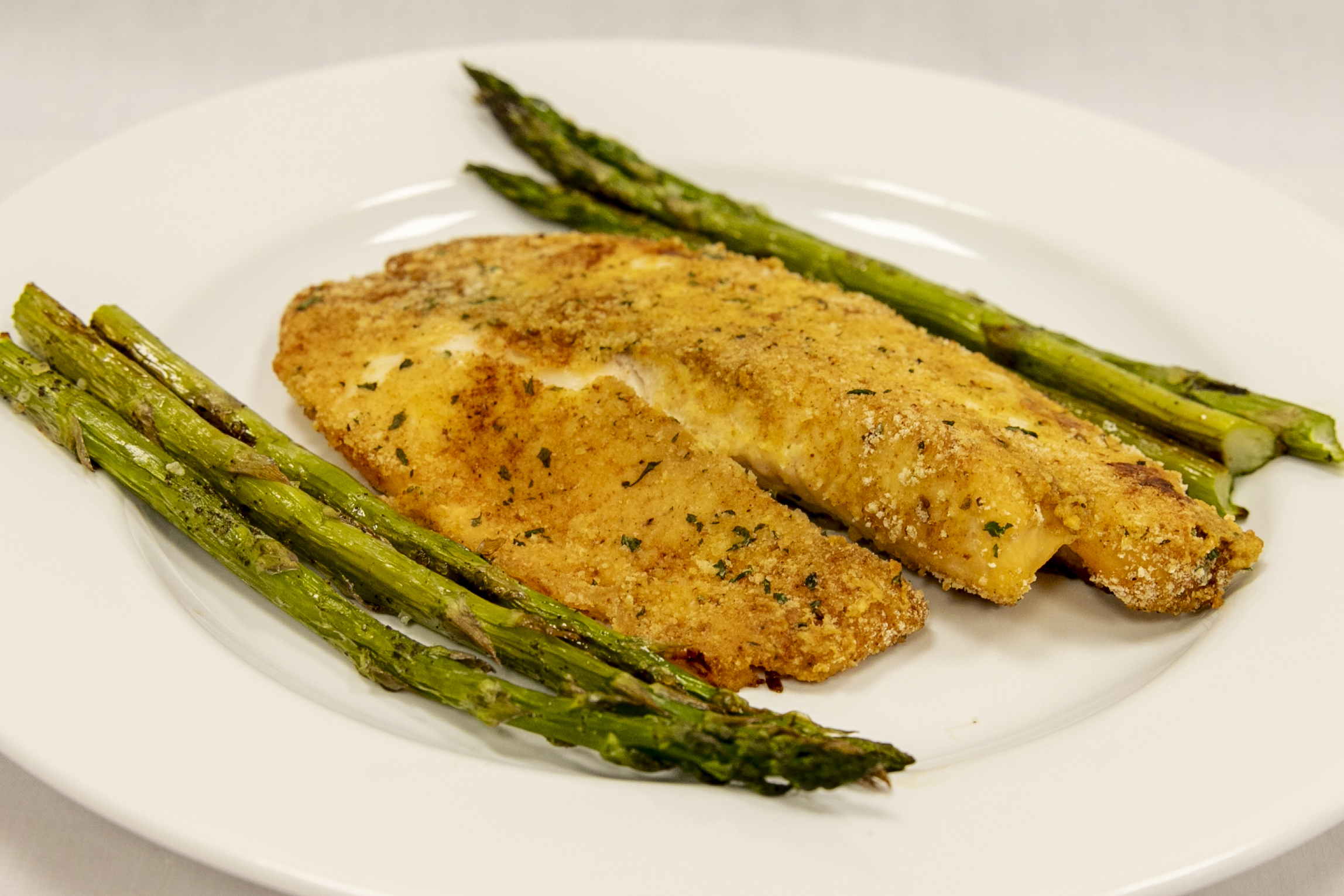 https://upload.wikimedia.org/wikipedia/commons/f/f5/Sheet_Pan_Tilapia_with_Asparagus_-_50383991247.jpg