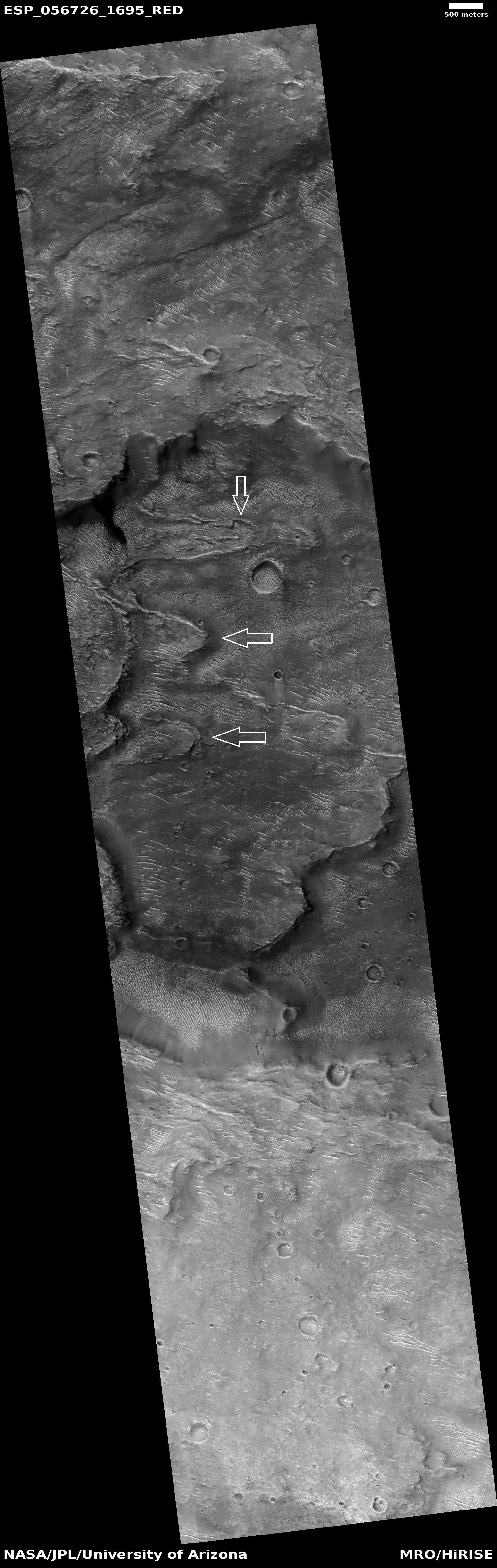 Ejecta lobes indicated with arrows in a crater