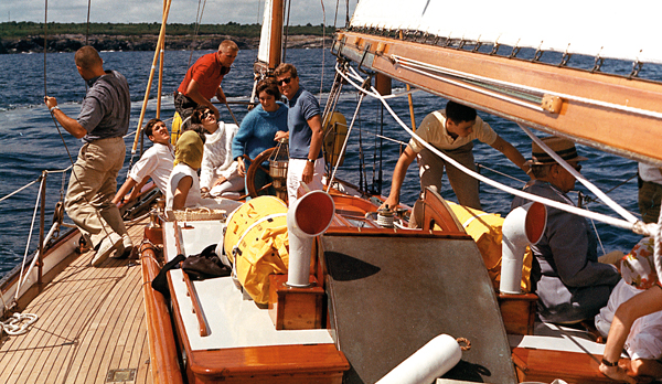 A young John Kerry (in white) aboard the yacht of President John F. Kennedy, in August 1962