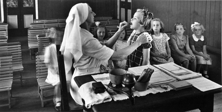 File:Queensland State Archives 2870 Medical examination with the School Health Services October 1946.png