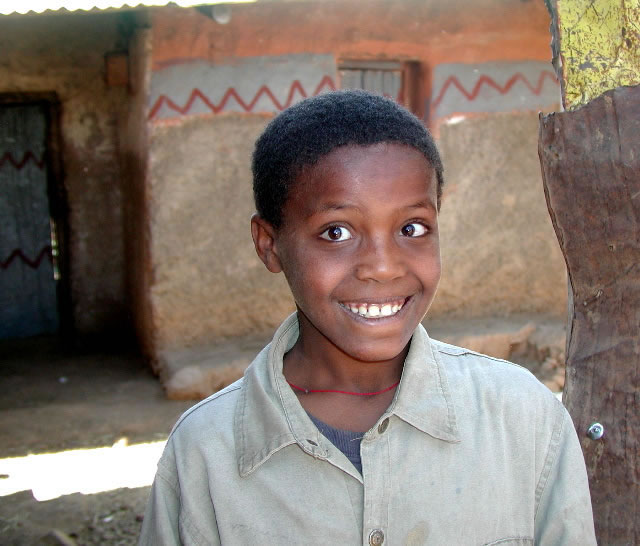 File:Young boy in front of his home-Lalibela.jpg