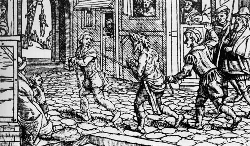 A woodcut of circa 1536 depicting a vagrant being punished in the streets in Tudor England