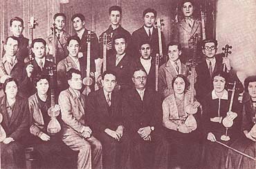 File:Uzeyir Hajibeyov with orchestra of Azerbaijani folk instruments.jpg